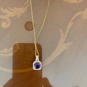 Elegant Gold Necklace with Purple Pendant